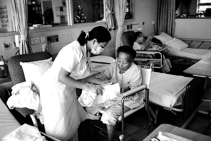 Nurse Preparing Elderly for Shower