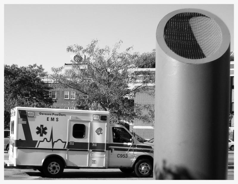 toy ambulance and cylinder