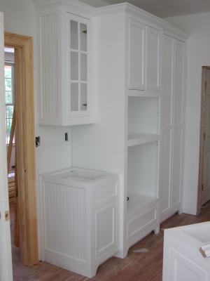 Kitchen cabinets where the oven and microwave will go