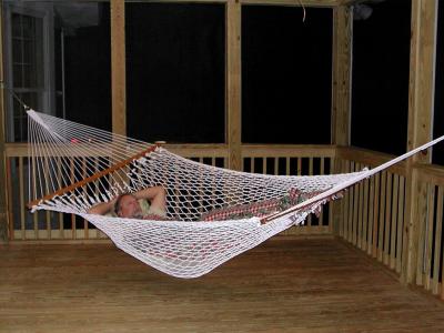 Mike finds his place under the fan in the screen porch