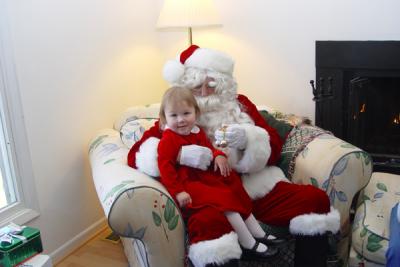 Reagan cuddles up to Santa