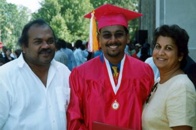 My parents and I at HS graduation