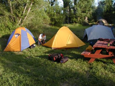 AT LOTUS CAMP: P5252331 gaspar setting up his tent