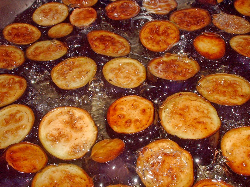 eggplant frying in hot oil for lake palace eggplant