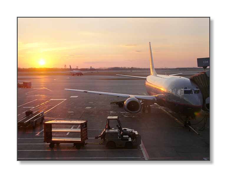 <b>Heading Home, OHare Sunset</b><br><font size=2>Chicago, IL