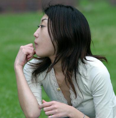 Pensive Asian girl