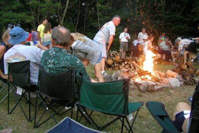 Each nite, MASHOUT campers gather around the campfire near Keg Row...