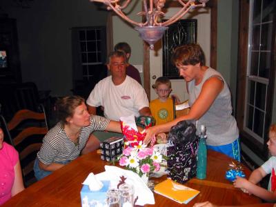 Carol opening presents