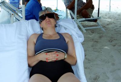 Judith lounging on beach