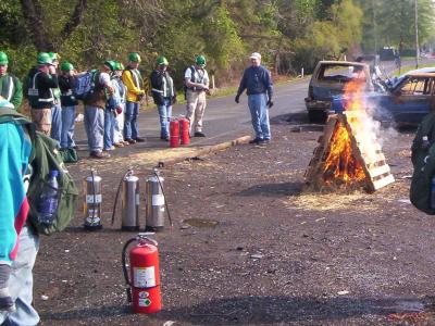 This is a fire. That is an extinguisher.