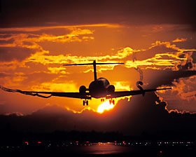 Continental Airlines DC9 landing sunset aviation stock photo #SS9502
