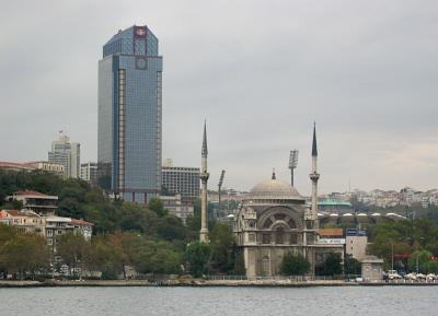 Modern thing looms over Mosque ofthe  Dolmabahce Palace