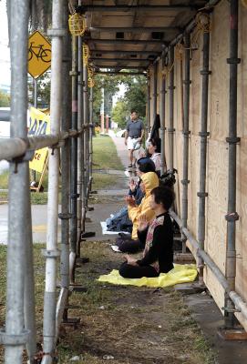 praying women at Chinese consulate