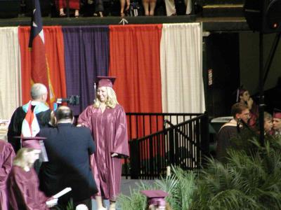 Grabbing the Diploma.JPG