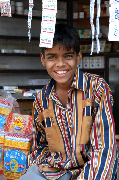 Boy with a roadside stand, Gwalior, India