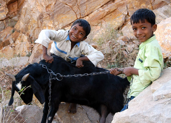 Kids with a goat on the path to Tiger Fort