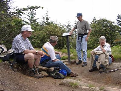 discussing the hike back: Dick Roemer, Ed Riley, Jim Holmes, Carolyn Brown.