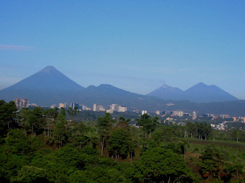 Blue sky, Volcanoes, City and Trees