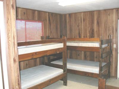 Each cabin has two sets of bunkbeds and one single bed