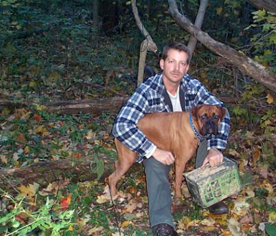 Chris and Biscuit with the cache.