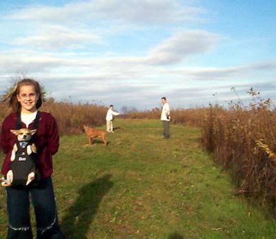 Syd toting Boo, Wes and Chris playing with Biscuit.
