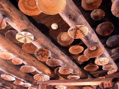 A ceiling adorned with baskets