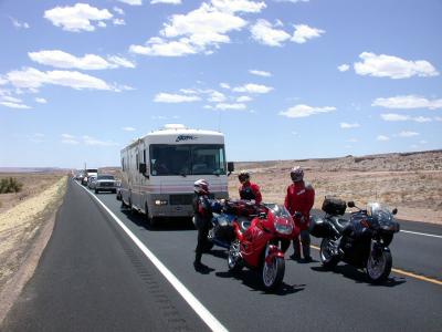 A long line of traffic is stopped behind us