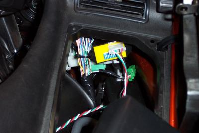 I snaked the wires down from the right glovebox.  Notice I zip tied the box to the wire harness.
