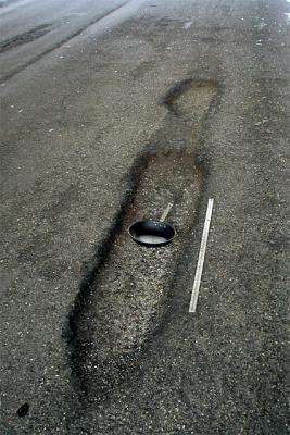 Outtake for DPC On The Road challenge, June 2002. The shiny object to the right is an aluminum 1-meter measuring stick. I may go back and shoot this again from the other side so it more closely resembles an exclamation point.