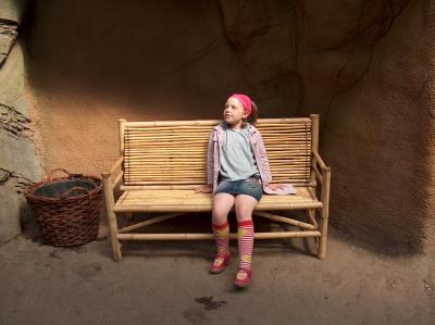 Hanna on a bamboo bench
