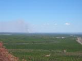 View towards Brisbane from the lookout with a bush fire in the distance.