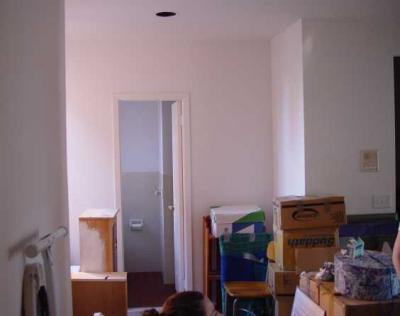 View From Front Door to Bathroom, Kitchen Off to the Right