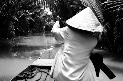 Rowing Down Mekong Canal