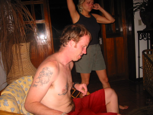 john gets back in the comfy chair