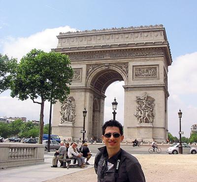 me in front of the arc de triomphe in Paris
