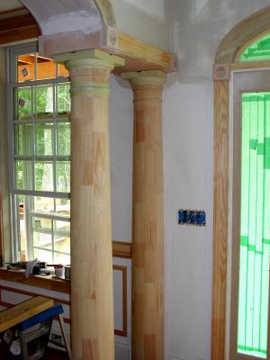 Columns to the dining room entrance take form