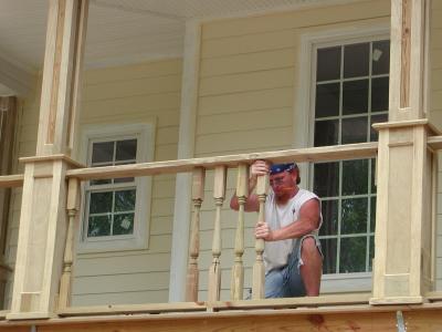The railing and balusters go on the front porch