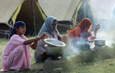 Cooking in front of tents