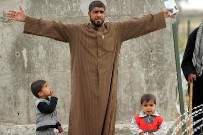 Iraqi man with his sons