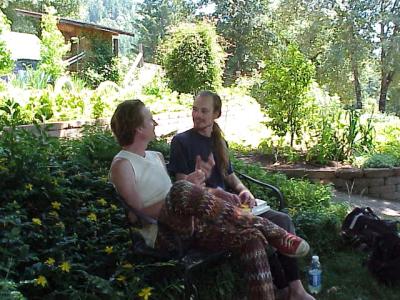 Robert and Ghreg converse in the gardens