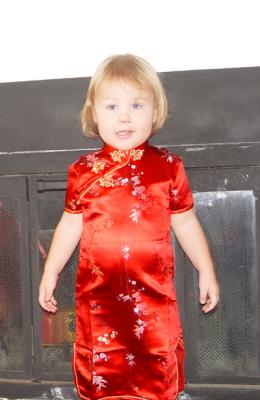 Reagan in the dress her Grandpa sent from Singapore
