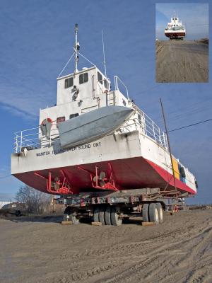Ferry barge Manitou awaits return to the river at Moosonee April 30, 2005