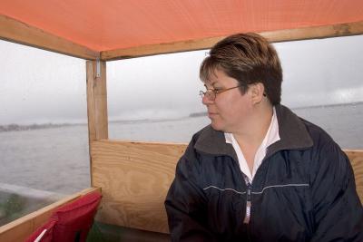 Taxi boat passenger on a rainy day