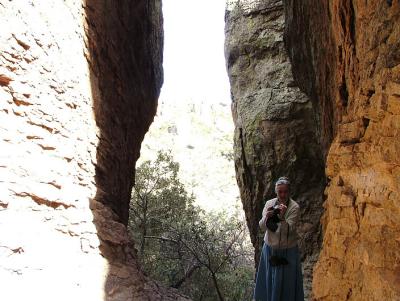 Karen pauses, on the Echo Canyon Trail, to check a digital photo she has taken