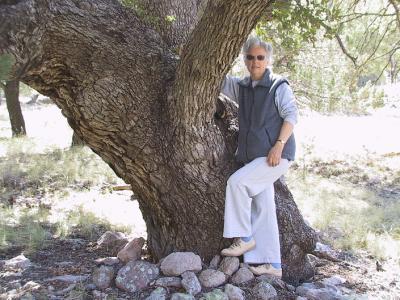 Ethel poses beside a large old oak, on Faraway Ranch