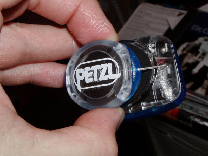Petzl zipka back - the headband is contained in a springloaded reel which Im holding the torch by.