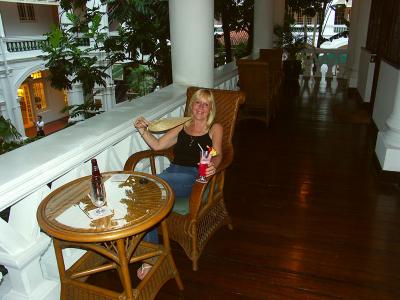 Enjoying a Singapore Sling at Raffles