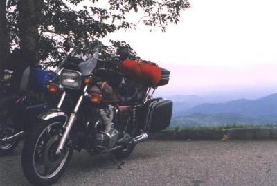 '78 XS1100E along the Blue Ridge Parkway in 1997. Set up for sport touring. Superbike bars, small windshield, detachable bags.