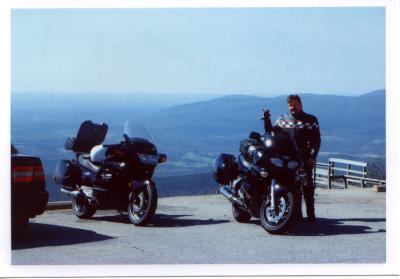 My '91 ST1100 and STeve with his Triumph ST on a cold day in March 2002 at the lodge along the Talimena Parkway.