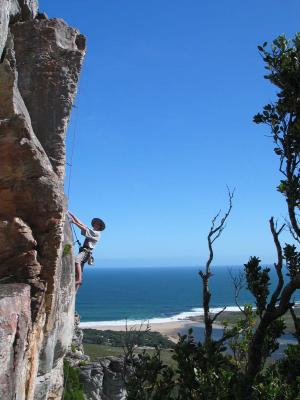 Jeremy styling above the crux of a 24
